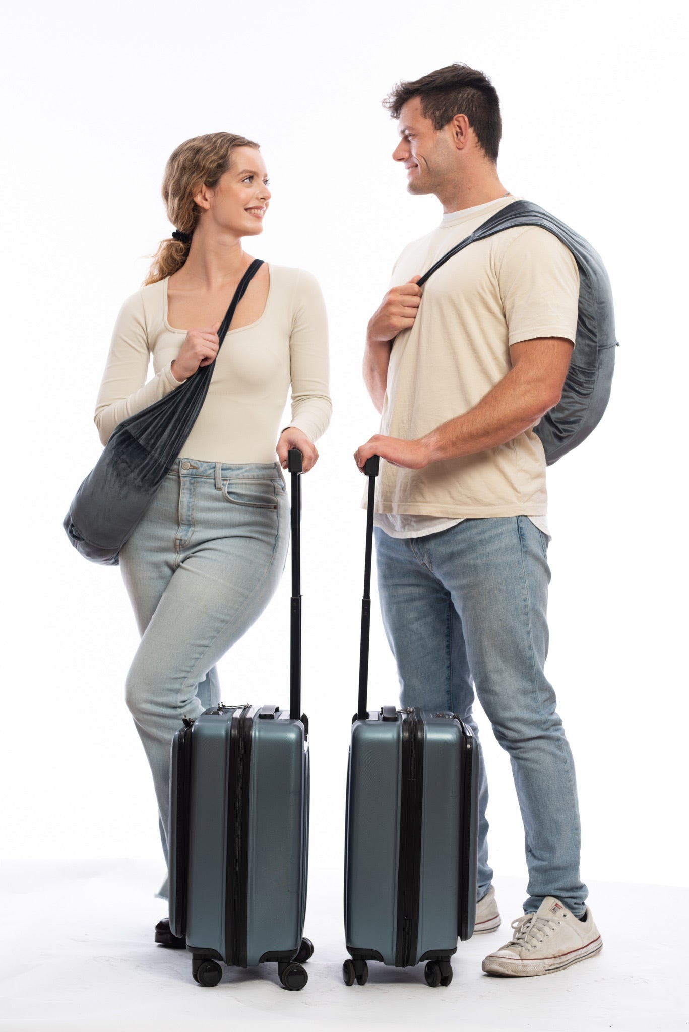 Lightweight stuffable travel pillow that fits in personal item and holds clothing